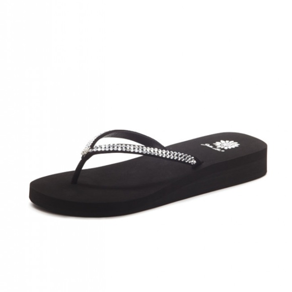black yellow box flip flops